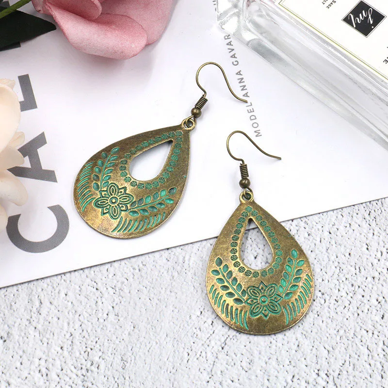 

Bohemian Vintage Waterdrop Earrings Hollow Engraving Floral Leaf Charm Earring Handmade Drop Shape Dangle Earings Jewelry Boho