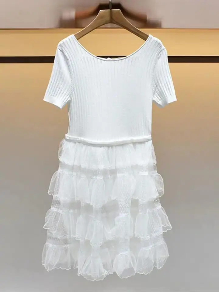 

In the summer of 2019 the new women's round collar short sleeve backless lace lace knitting dress cake