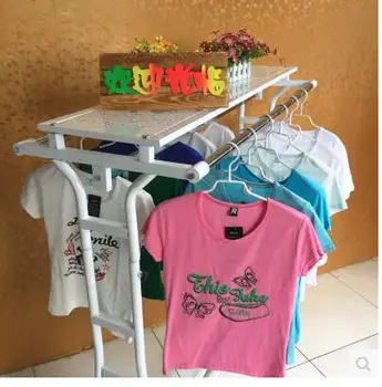 

Iron art double bars display a dress shop for women's clothing stores