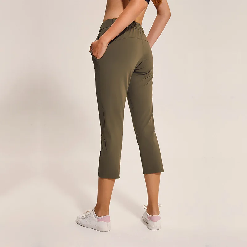 NWT Women Outside Pockets Gym Capris 4 way Stretch Fabric Boot Cut Casual Crop Sports Yoga Leggings with Wide Leg Leggings NWT Women Outside Pockets Gym Capris 4 way Stretch Fabric Boot Cut Casual Crop Sports Yoga Leggings with Wide Leg Leggings
