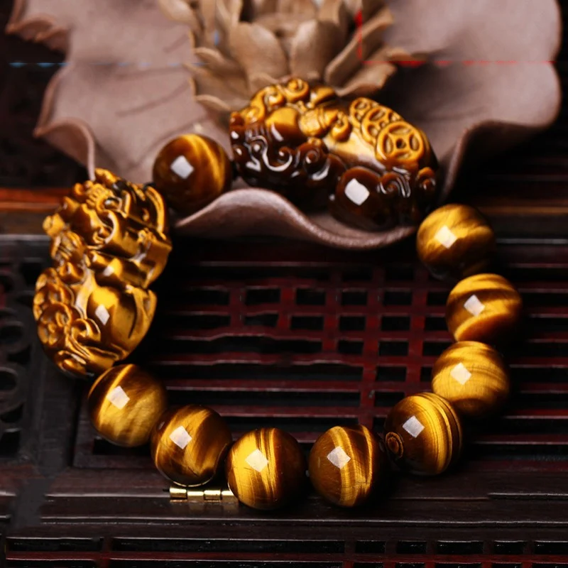 

The mythical wild animal stone bracelet with yellow tights eyes Tiger's eye the mythical wild animal evil fortune