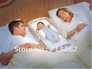 baby bassinet in bed