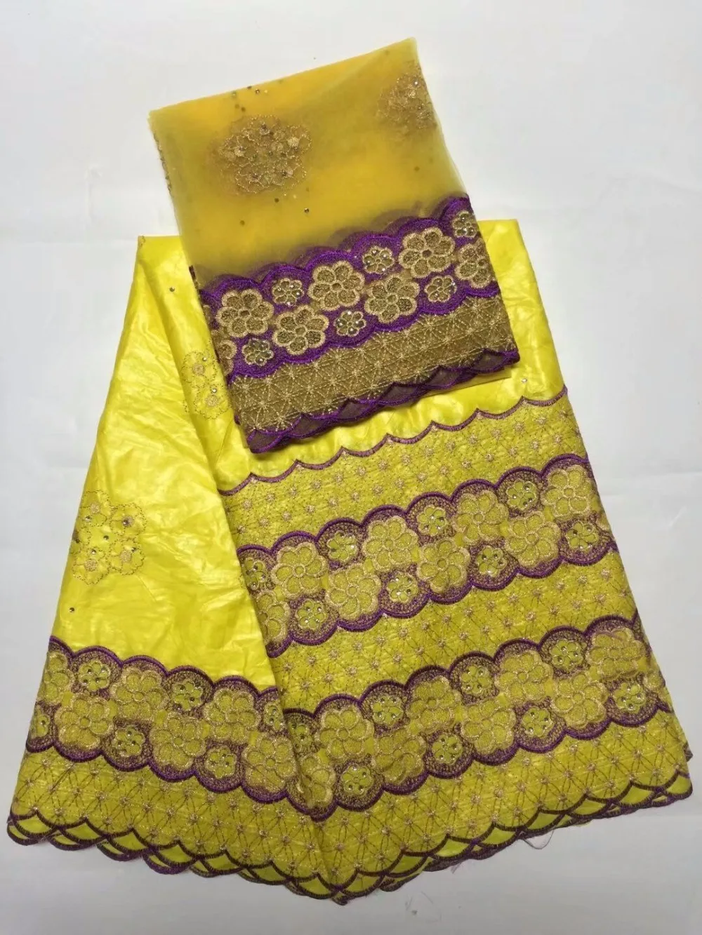 

Nigerian stone latest lace fabric wholesale 2017 African best cotton bazin riche getzner fabric for Nigerian Wedding dress