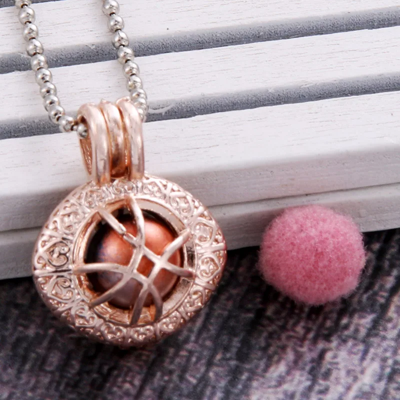 

3 colors football shape Aroma Diffuser Necklace Perfume Essential Oil Diffuser Aromatherapy Pendant Necklace Pearl cage Pendant