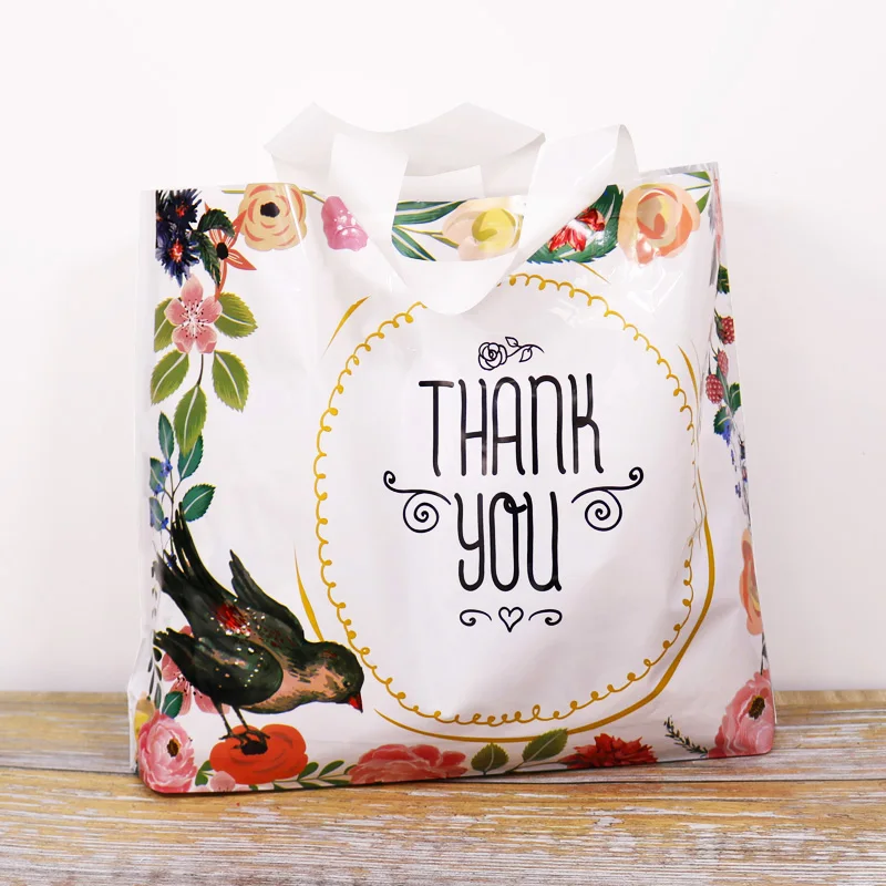 

50pcs Shopping Plastic Bag Clothes Packaging Bags Thank You Flower Plastic Gift Bags Cellophane Food Candy Cake Bags with Handle