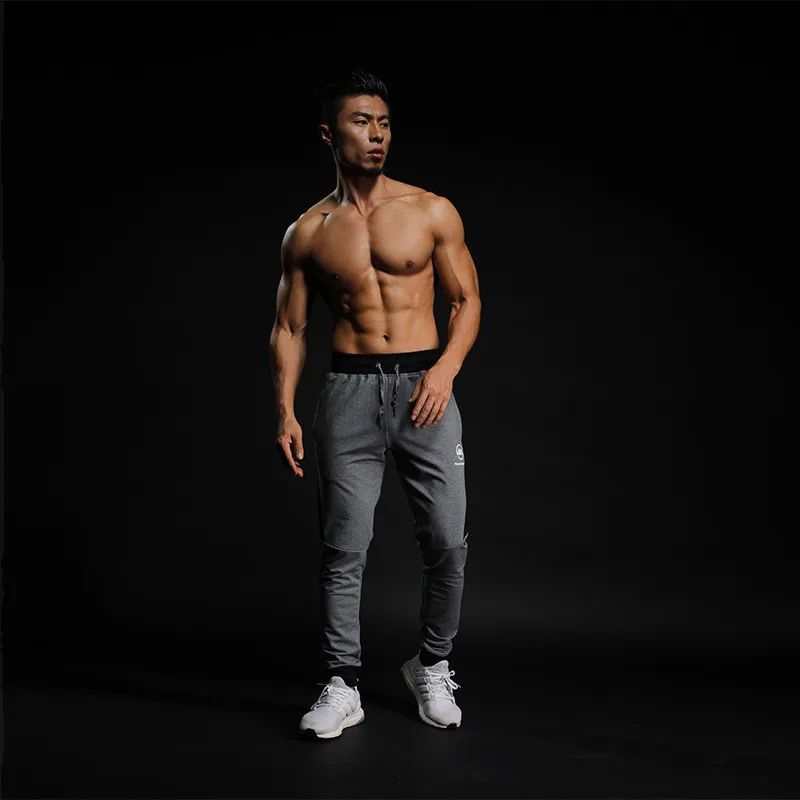 2019 Fashion Mens Pants New Solid Color Casual Soft Elastic Cotton Skinny Sweatpants Bodybuilding Pencil Trousers Gyms Clothing