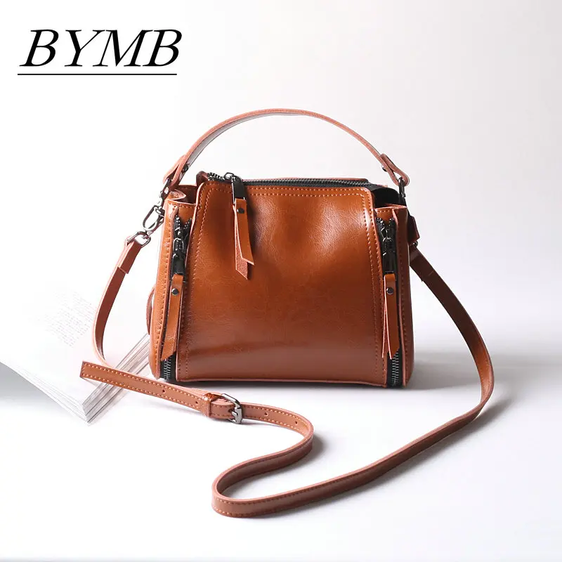 

2017 new real leather bucket bag Simple fashion mini bag Single shoulder oblique cross - packet 100% Genuine leather bags