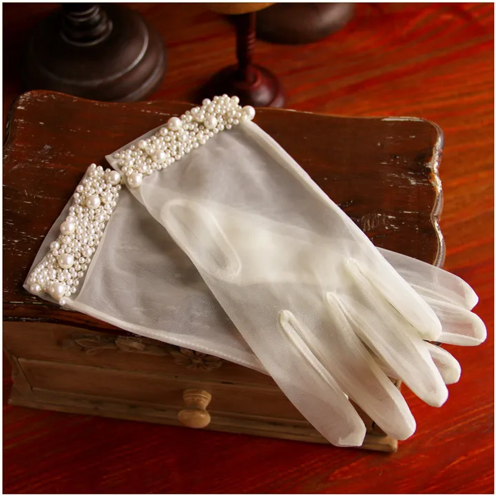 

Women's elegant pearl beaded perspective mesh short gloves female white color sexy lace glove R1659