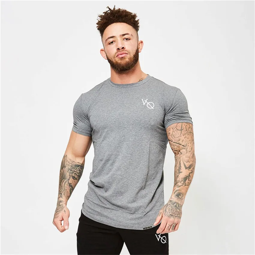 

2018 Summer Men's New Muscle Fitness Mens T shirts Tourism Solid Color Men T-shirt Fashion Tide Brand Men's Short Mens T shirt