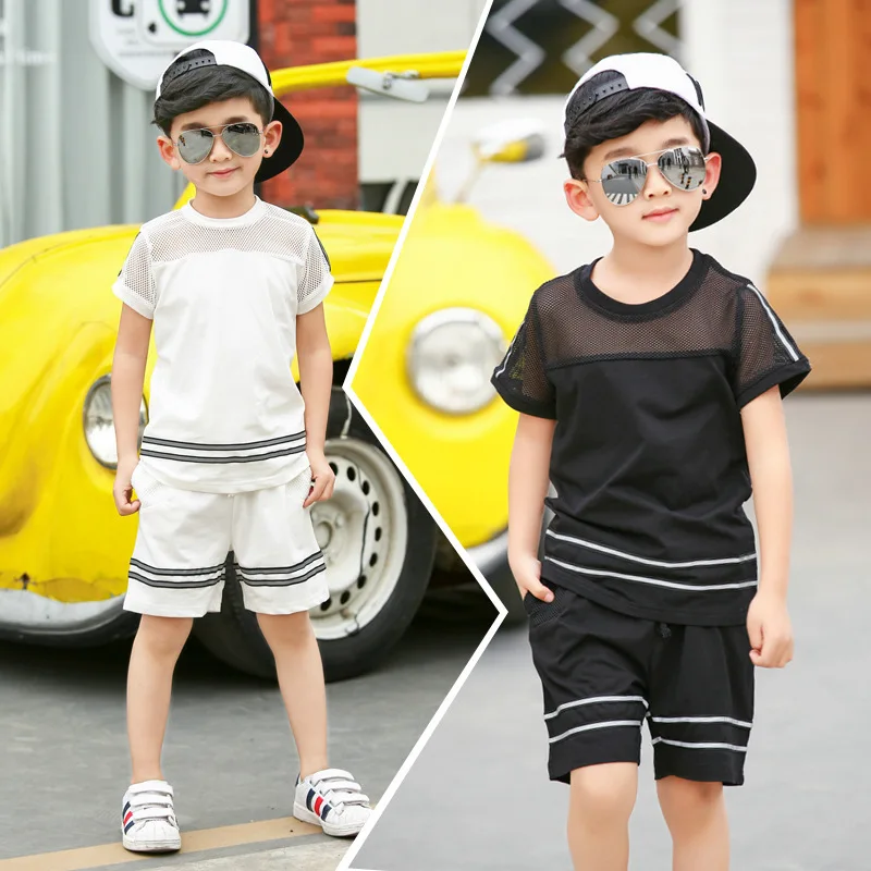 2018 Nuovo Arrivo Precipitò Cotone Fur Unisex Bambino Vestito Abiti Estivi Manica Corta Moda Split Comune Griglia di Abbigliamento Per Bambini