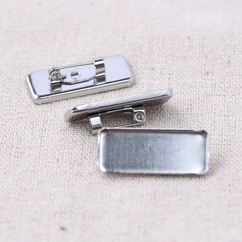 

reidgaller 10pcs fit 10x25mm rectangle cabochon brooch base trays diy stainless steel blank brooches setting pin backs
