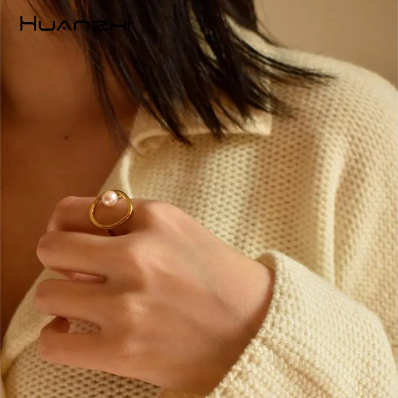 

HUANZHI Elegant Imitation Pearls Hollow Gold Color Metal Personality Design Geometric Finger Rings for Women Girl Party Jewelry