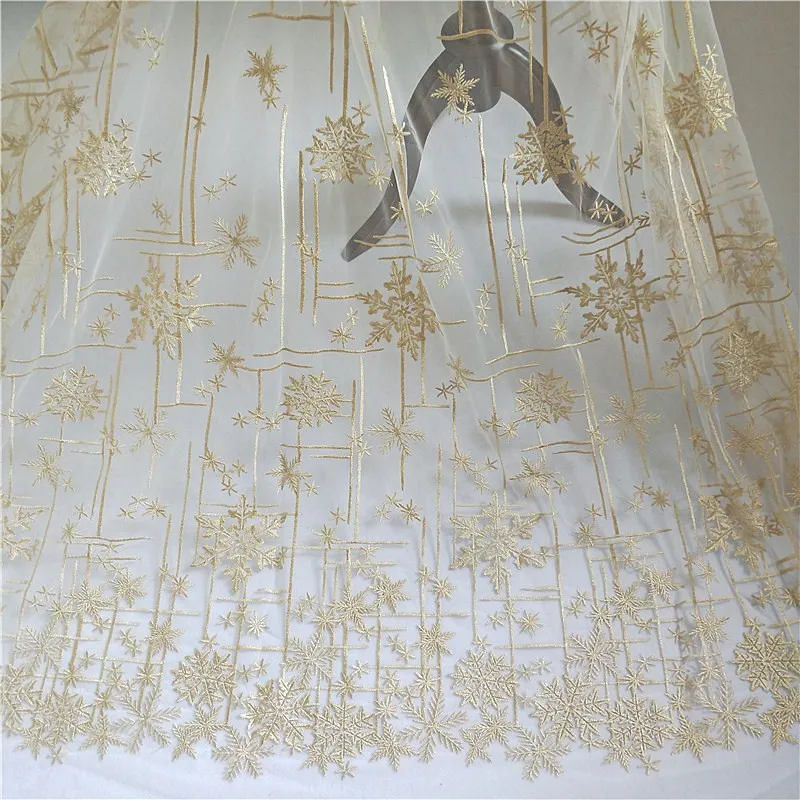 

New high-end beautiful golden embroidery snowflake lace fabric embroidery wedding stage dress children's wear DIY fabric