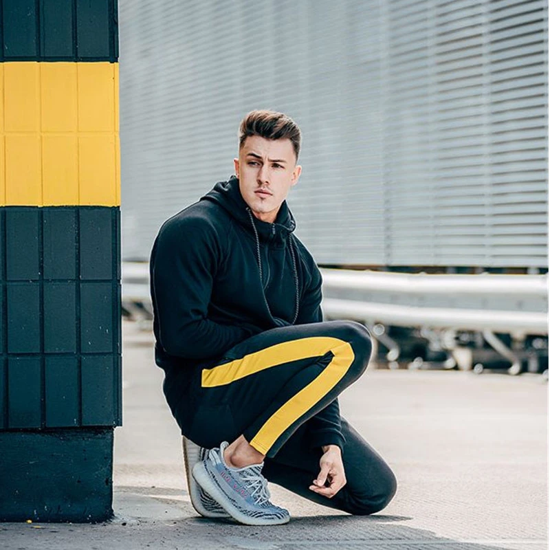pants fashion GYMPXINRAN New Men Pants Hip Hop Fitness clothing Joggers Sweatpants Side stripe classic fashion Streetwear Track Pants Trousers tan pants