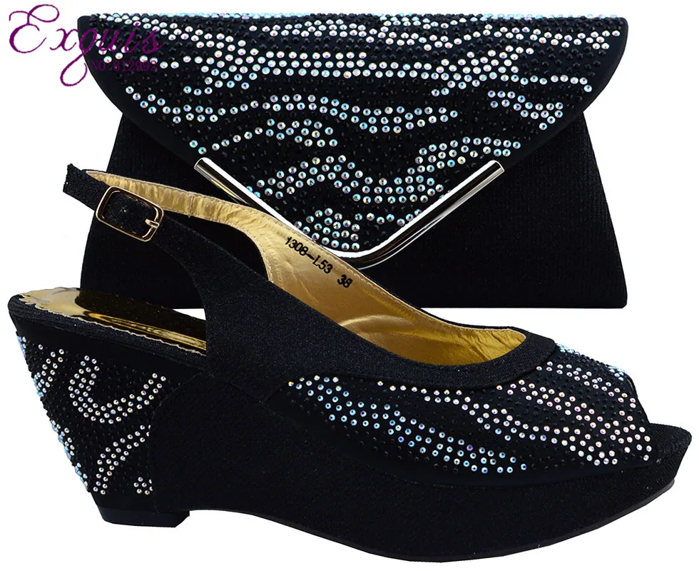 black and cream shoes with matching bag