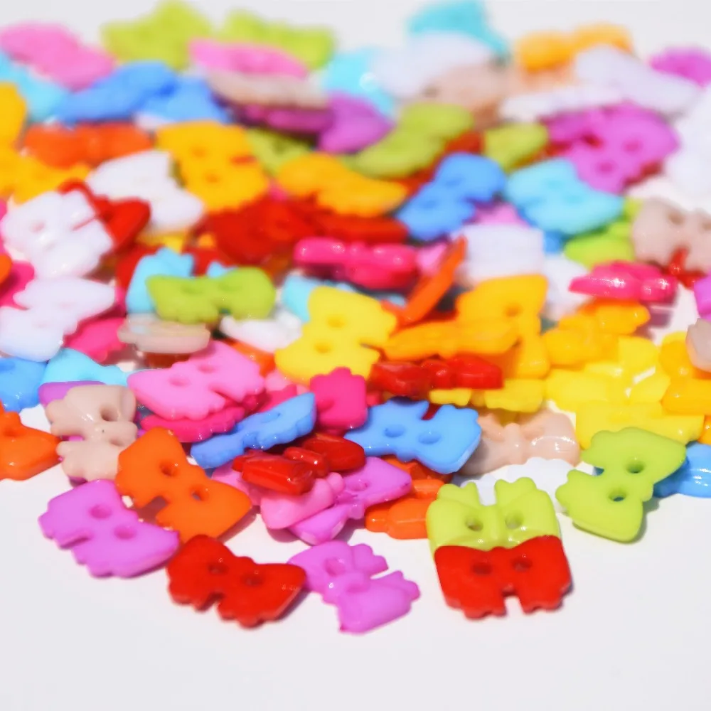 

100 pcs 10*14mm Plastic buttons 2 Holes Bowknot Mixed Design Painted decoration Sewing buttons Textil Accessories XP0049