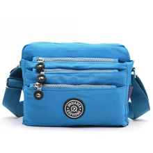 JINQIAOER Nylon Imperméable Femmes Messenger Sacs de Haute Qualité Sac À Main Occasionnel Embrayage Carteira Voyage Sacs à Bandoulière Kipled Style