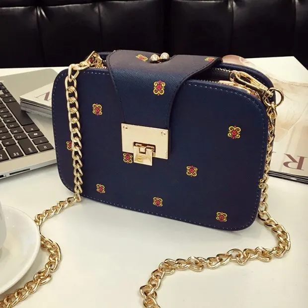 

Moil Fashioni Women PU leather Messenger Bags Rivet Chain shoulder Bag Designer female