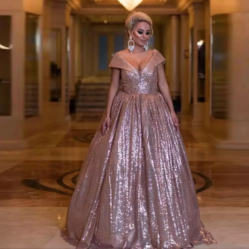 shining-pink-gold-ball-gown-quinceanera-dresses-v-neck-off-the-shoulder-floor-length-sequin-prom-gown.webp_