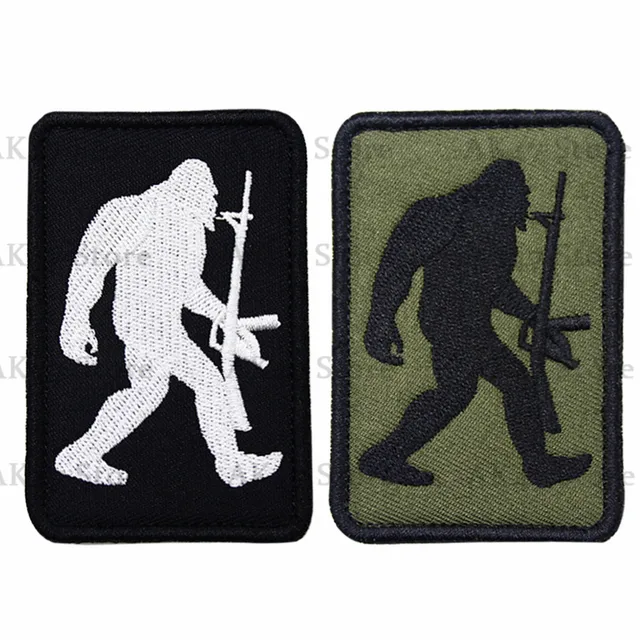 Armed Bigfoot take gun patch Reigning Hide and Seek Champion Bigfoot