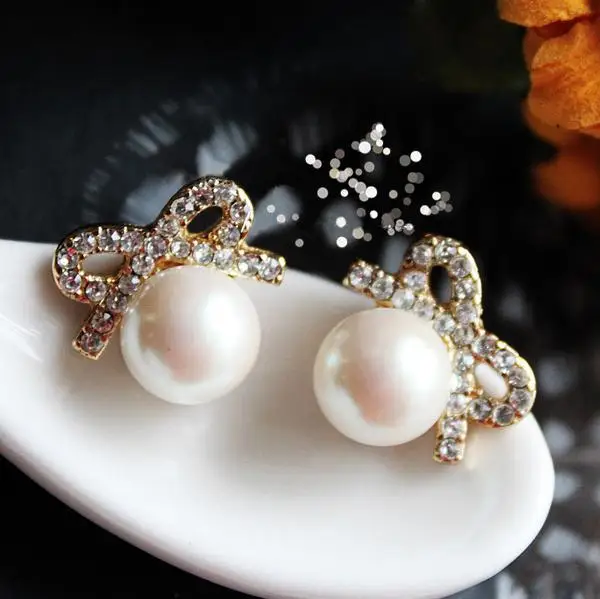 

Fashion Korean New full crystal bow Round pearl stud earrings Female