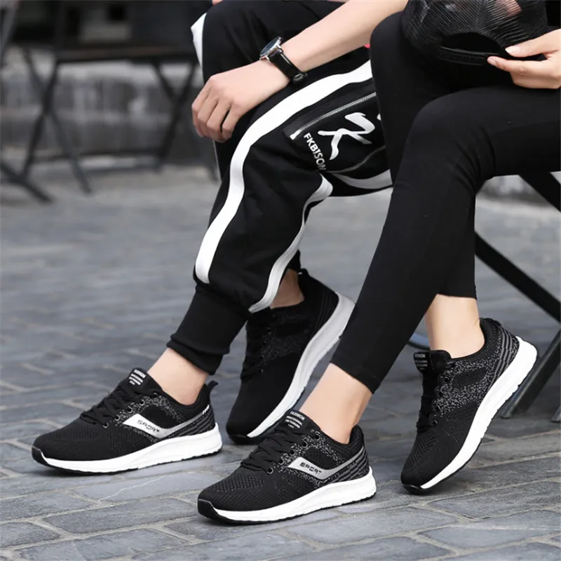 

2019 new mesh sports shoes men's shoes breathable women's shoes couple running shoes light and comfortable Women Sneakers