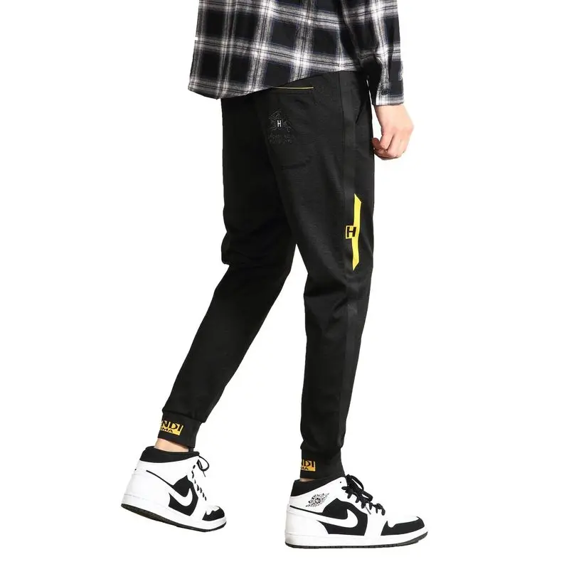 2019 spring men's sports casual pants new black elastic waist elastic beam feet feet pants tide brand Slim casual pants male 2019 spring men's sports casual pants new black elastic waist elastic beam feet feet pants tide brand Slim casual pants male