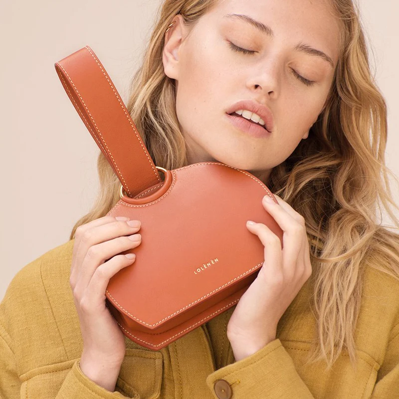 

Fashion bags for women Korea Tide brand 2019 new minimalist semi-circle hand bag wild chain diagonal small round bag