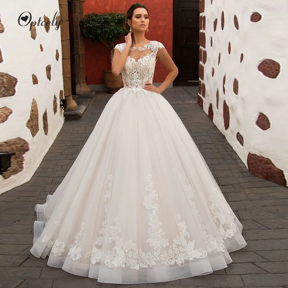 

Optcely New Arrival O-Neck Button Ball Gown Wedding Dress 2019 Luxury Appliques Cap Sleeve Princess Bridal Gown Vestido De Noiva
