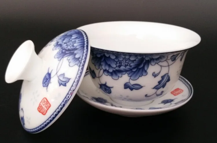 https://ae01.alicdn.com/kf/HTB1iQfQQVXXXXbUXXXXq6xXFXXXr/Jingdezhen-ceramic-cover-bowl-blue-and-white-three-gaiwan-tea-sets-hand-painted-ceramic-martial-arts.jpg