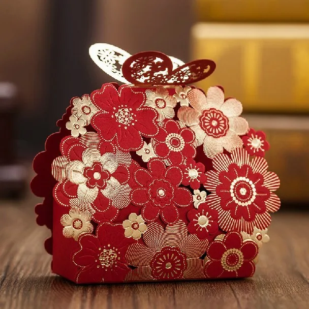 red and gold baby shower favors