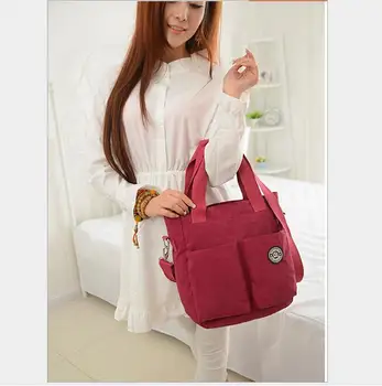 

JIN QIAO ER Special counter trend fashionable waterproof breathable nylon single shoulder bag handbag female bag mammy bag.