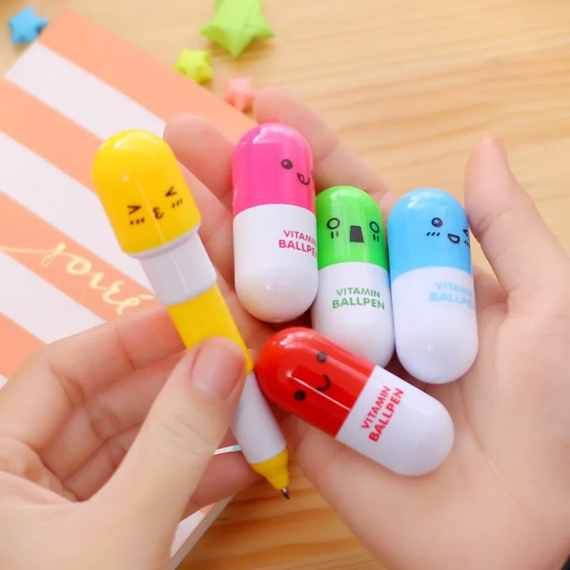 

Ayron 6 pcs/Lot Smiling Face Pill Ballpoint Pen Kawaii Novelty Stationery Telescopic Vitamin Capsule Ball Pens Student Learni