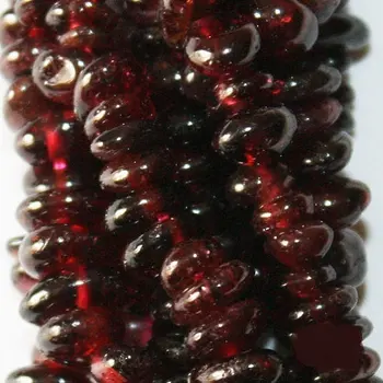 

Genuine Garnet Chips, bead size approx. 7 mm, long strand (36 inch).