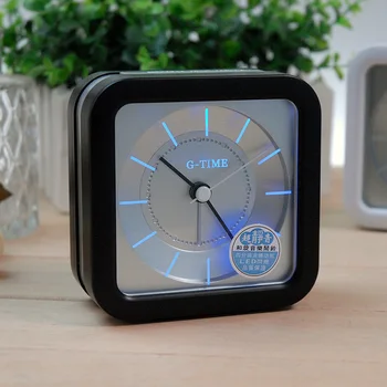 

Hot sale fashion noctilucent mini alarm clock bedside mute children student bedroom alarm clock Kids 9.2cm * 9.2cm * 4cm