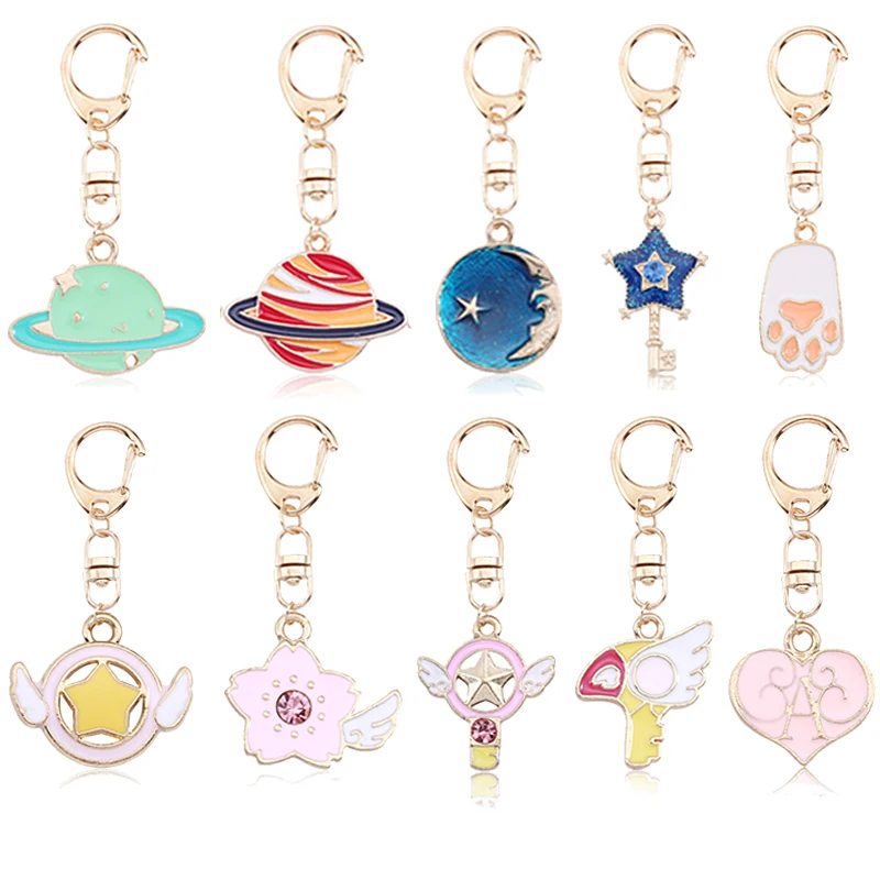 

Fashion Anime Magic Sakura Cartoon Keychain Personality Student Planet Moon Heart Pendant Keychain Bag Pendant Gift Jewelry
