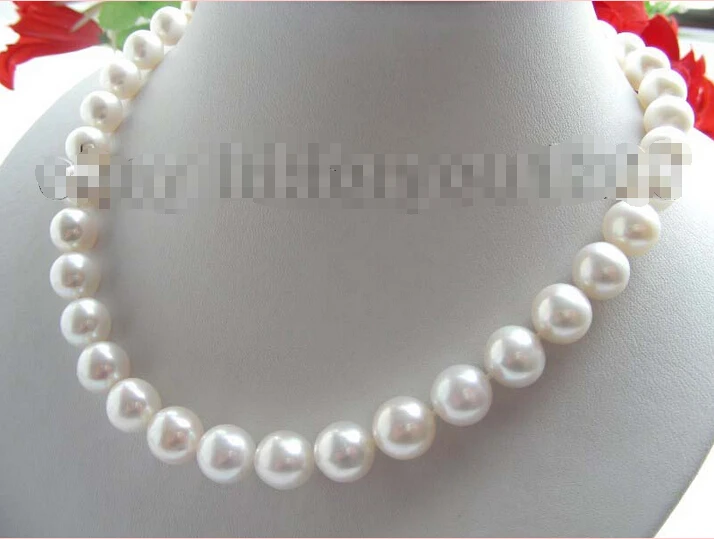

Free shipping >>>>>>AAA Natural 12mm White Perfect Round Pearl Necklace!