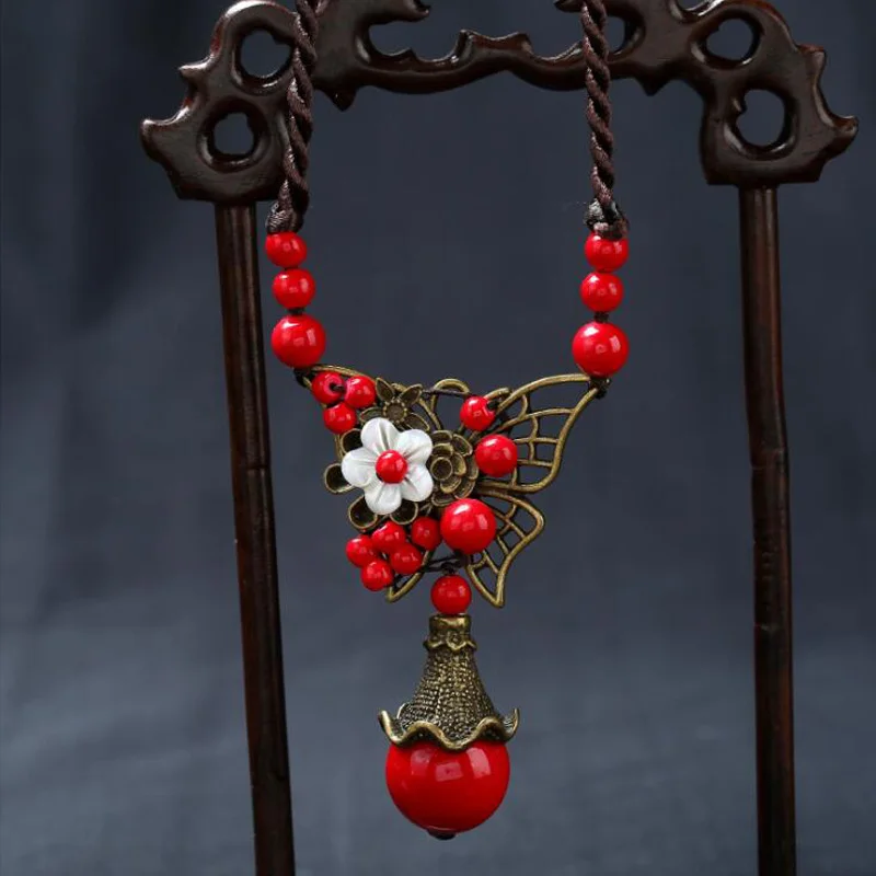 

Hollow Butterfly Shape Shell Flower Red Beads Clavicles Necklaces Carver Vintage Alloy Rope Necklaces For Women Charm Jewelry