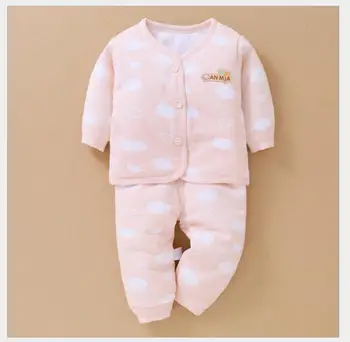 

Baby's soft undergarments with a heavy suit.