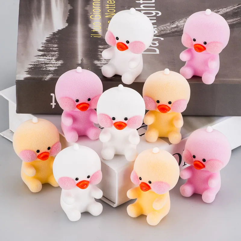

7cm Color Network Red Duck Flocking Toy Creative Gift Plastic Hyaluronic Acid Car Decoration Jewelry Plush Duck toys ty Psyduck