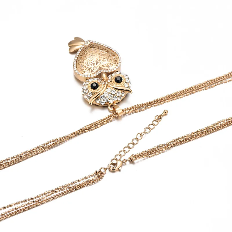 

Fanqieliu Hollow Out Owl Pendant Necklace Vintage 2018 New Long Sweater Chain Gold Rhinestone Necklace For Women FQL10193