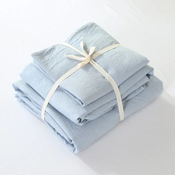 

100% Cotton Unique washed fabric 4pcs light blue fancy solid color bedding sets queen king size with fitted sheet elastic rubber