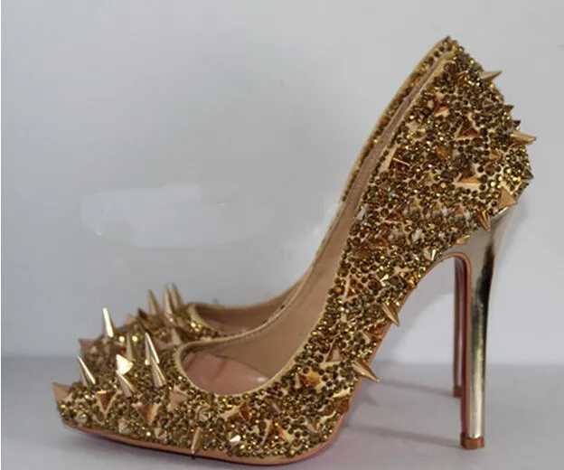 black heels with gold spikes