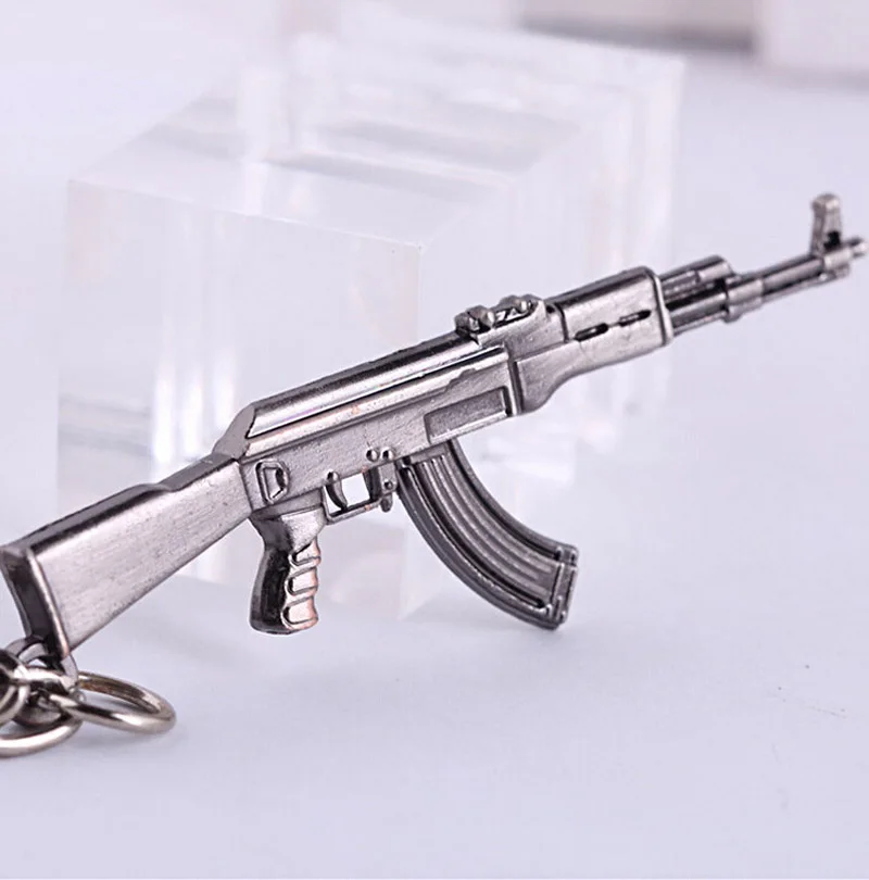 

Counter Strike AK47 Guns 6.5cm Keychain Trinket Awp Rifle CS Sniper Key Chain Key Ring Jewelry Souvenirs Gift Men Llaveros