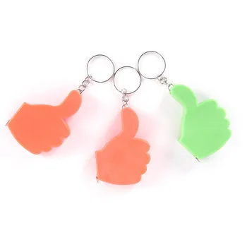

1PCS Measures Easy Retractable Tap Mini Tapee Measure Pull Ruler Keychain Key Ring Measuring Tools Color Random