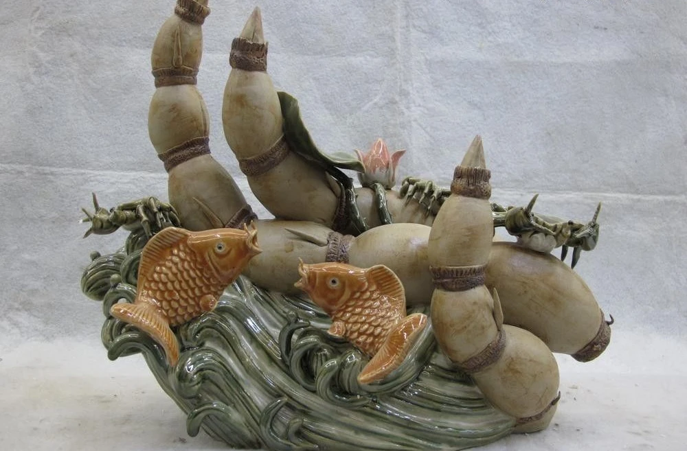 

Chinese Pottery WuCai porcelain Feng Shui wealth lotus root flower Fish Statue