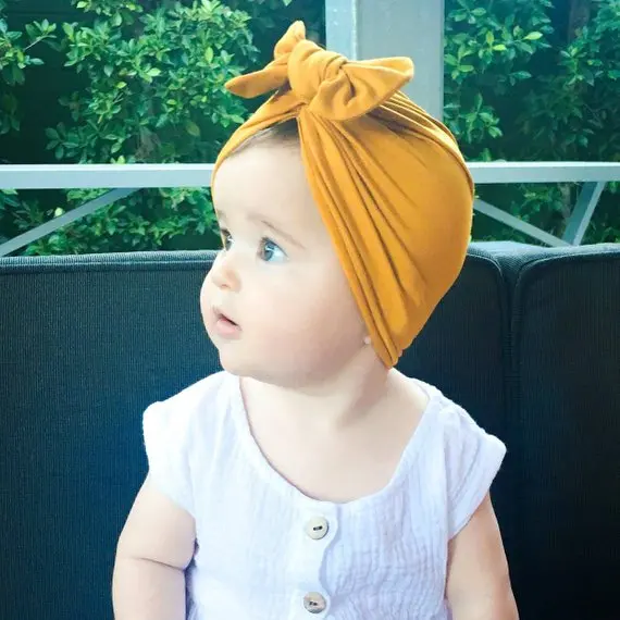 

Solid Cotton Infant Baby Beanie Caps for Girls 3 4 6 9 12 16 Month /Bowknot Baby Turban Hats Newborn Girl Toddler 18 24M Spring