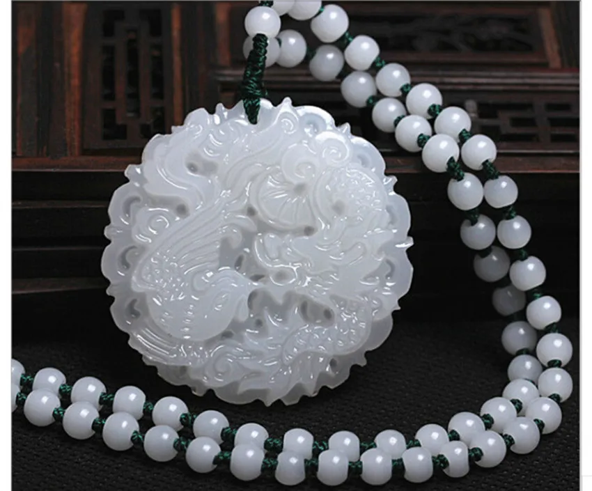 

Fashionable natural hetian white material carved dragon and phoenix pendant/1