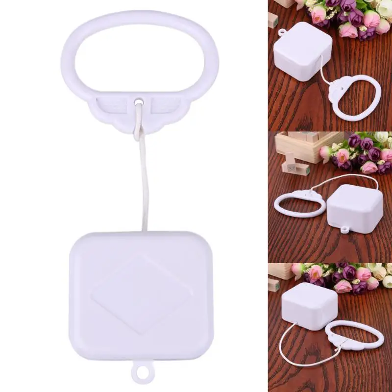 

1 pc Plastic Pull String Clockwork Cord Music Box Pulling Ring Music Box Safe ABS Baby Kids Bed Bell Rattle Toy Birthday Gift