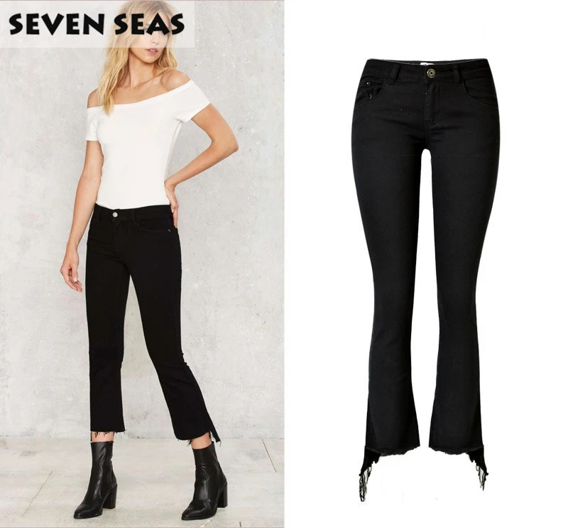 black jeans with tassels